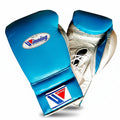 A pair of blue and silver boxing gloves with the Winning brand logo visible on the wrist strap and front pad, set against a plain white background.