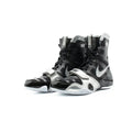 A pair of Custom Nike HyperKO boxing shoes in a black and silver colorway, featuring a forefoot lockdown strap and Nike Swoosh, displayed on a white background.