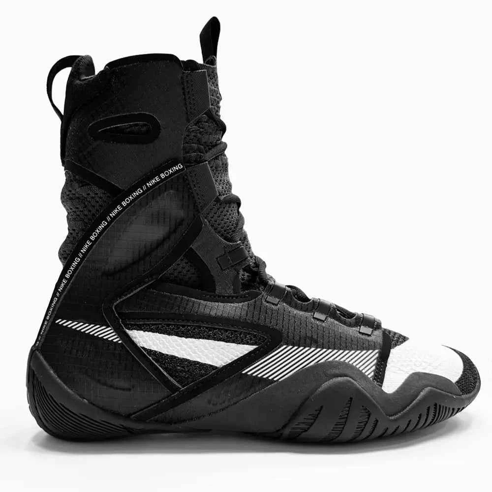 A Custom Nike HyperKO 2 boxing shoe in a sleek black and white colorway, featuring a black structural exoskeleton and white detailing, displayed on a white background.