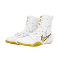 A pair of Custom Nike HyperKO boxing shoes in a crisp white and gold colorway, featuring a white forefoot lockdown strap, a gold sole, and a gold-outlined Nike Swoosh, displayed on a white background.