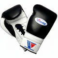A pair of black and white boxing gloves with the Winning brand logo visible on the wrist strap and front glove.